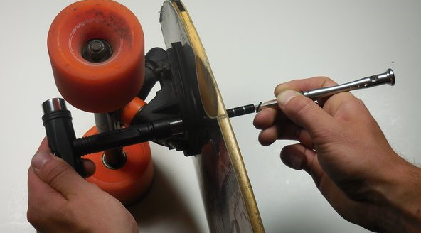 loosening a skateboard nut